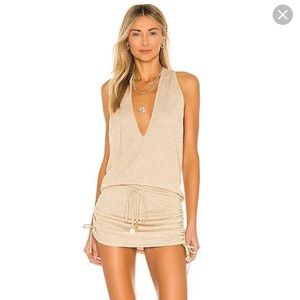 Brand new luli fama swim cover up in gold color.